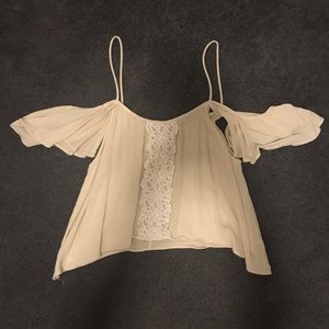 Cream colored and lace off the shoulder blouse